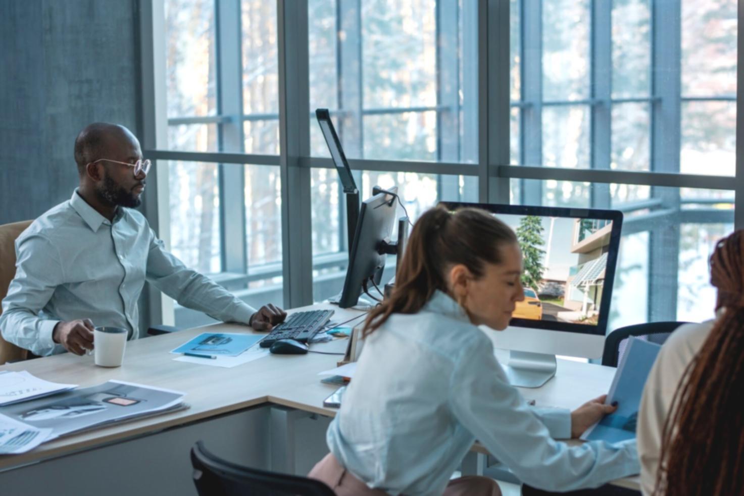 Financial professional reviewing complex spreadsheet data